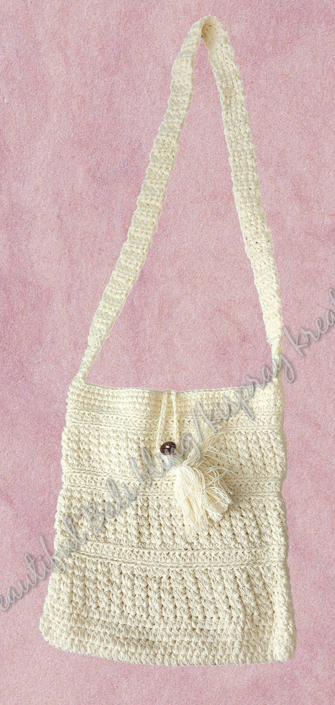 Crochet bag, cream approx  28cm x 25cm. Strap 48cm long Complete length 77cm approx