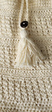 Crochet bag, cream approx  28cm x 25cm. Strap 48cm long Complete length 77cm approx