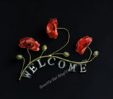 Wall art Poppy Welcome sign measuring  47cm x 39cm