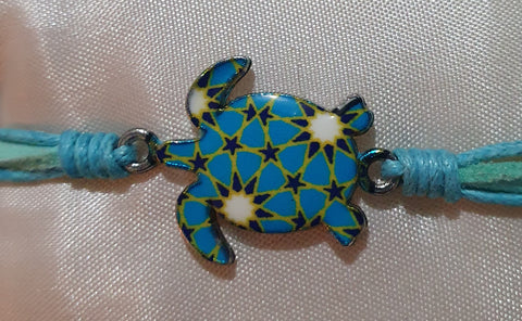 Friendship bracelets turtles light blue/green band