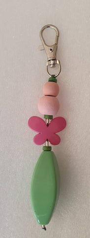 keyring/bag clip or charm pink/green approx 16 cm long.