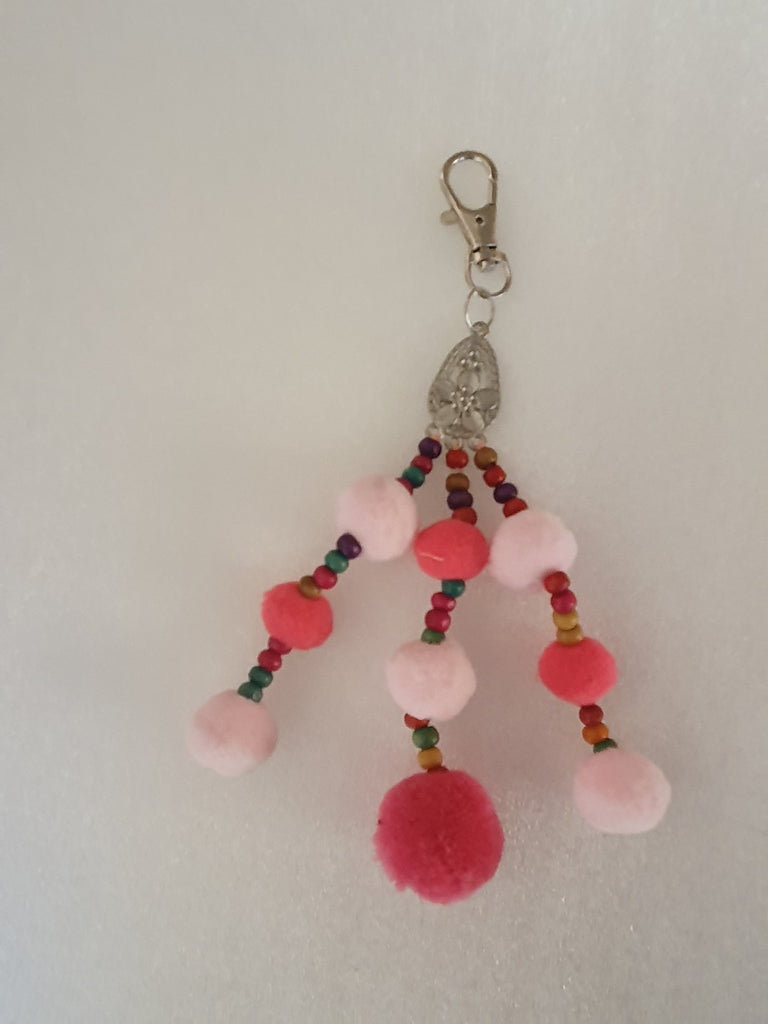 keyring/bag clip or charm pink pompom approx 16 cm long.