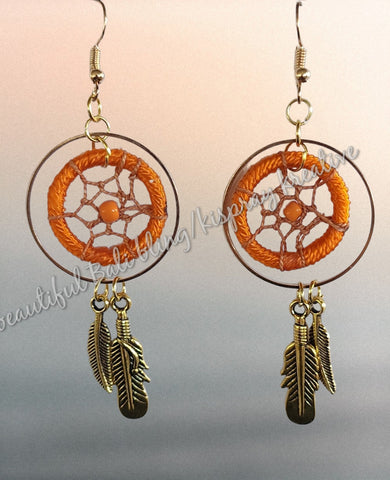 Ear rings, dreamcatcher Gold & orange, length from top of hook approx 9 cm