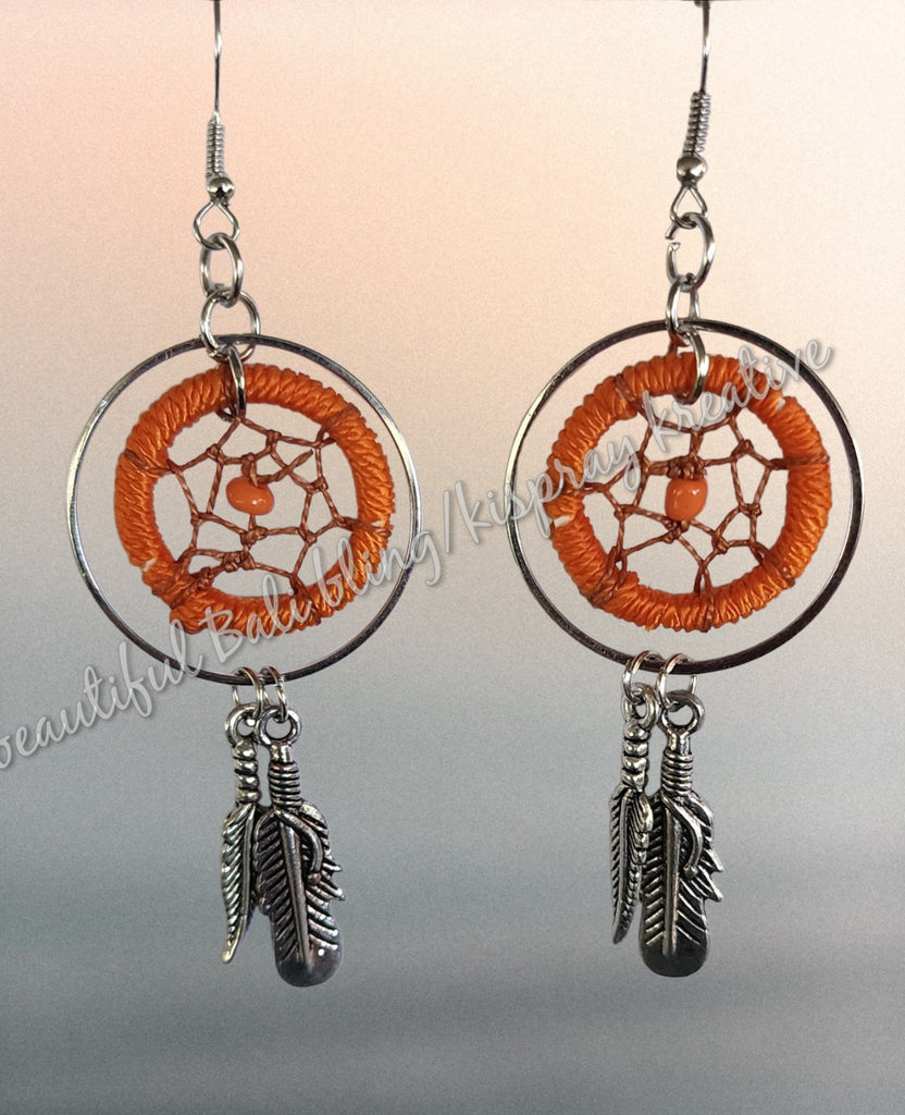 Ear rings, dreamcatcher Silver & orange, length from top of hook approx 9 cm