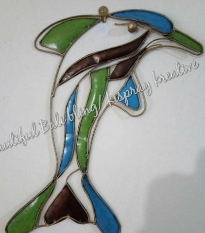 Wall art Dolphin measuring  22cm wide x 43 cm high in full